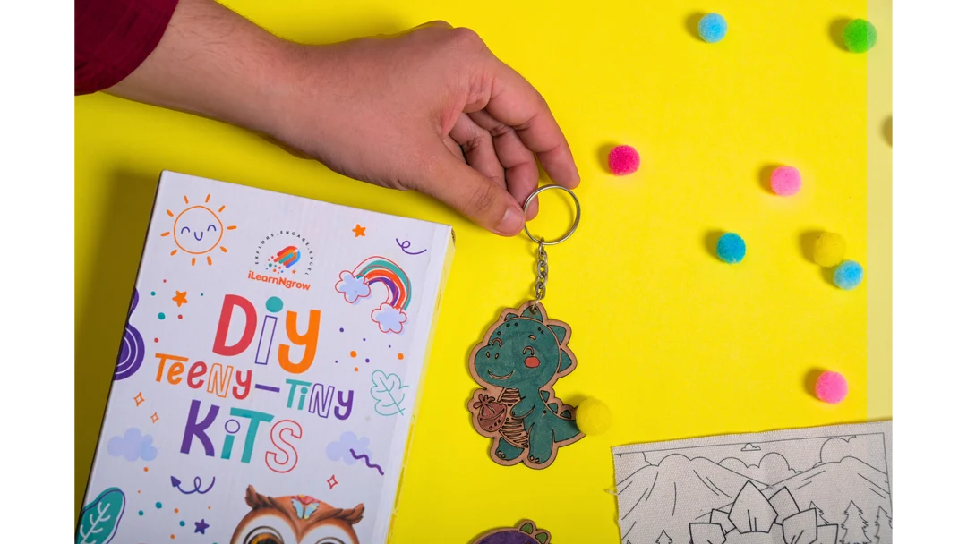 Ilearnngrow Dino Rakhi Combo – DIY Dinosaur Painting Kit | Dino Keychain, Fridge Magnet, Canvas Painting & Dino Rakhi