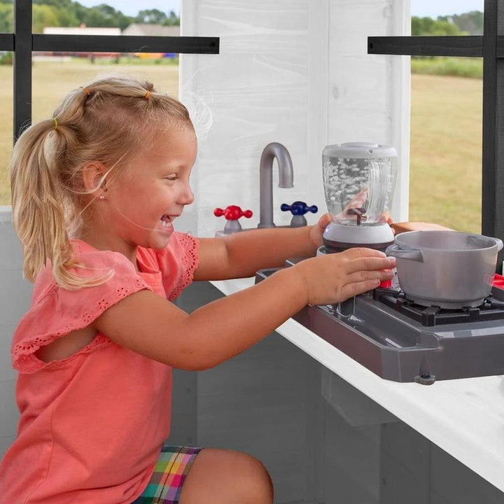 Sweetwater Heights Elevated Playhouse with Wave Slide, Wrap-Around Deck & Kitchen | Weight- 105.69 Kg (2-10 Years)