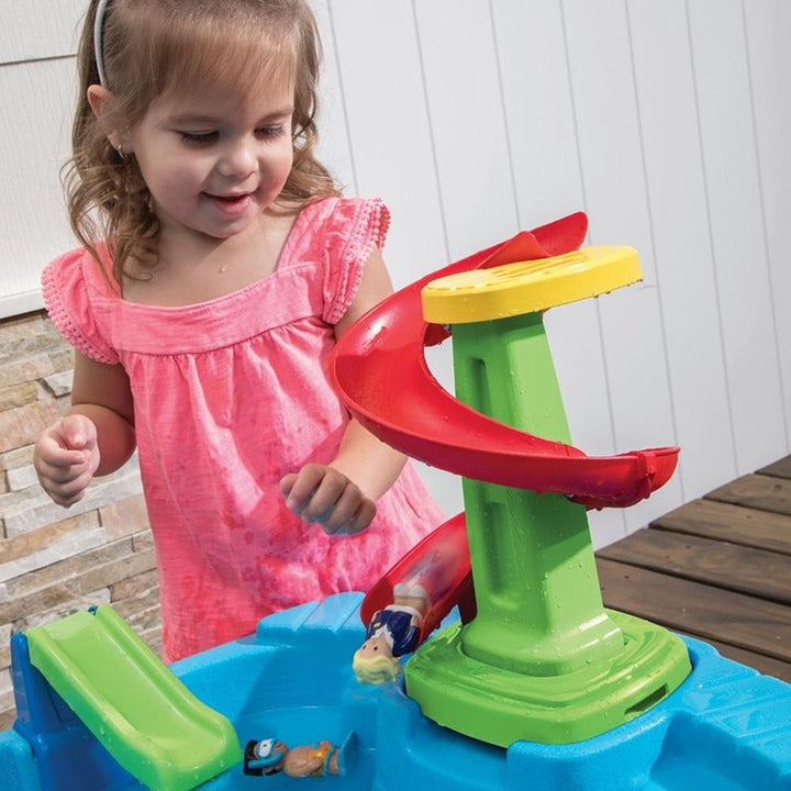 STEP2 Fiesta Cruise Water Table with Umbrella | Sand & Water Playset with Slide, Rain Shower & Lid (2-6 Years)