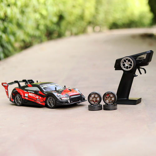 Remote Control 4x4 Drift Racing Car with 4 Spare Wheels - 2.4GHz Frequency, Light & Sound | 1:16 Scale (5-12 Years) | Assorted Colors