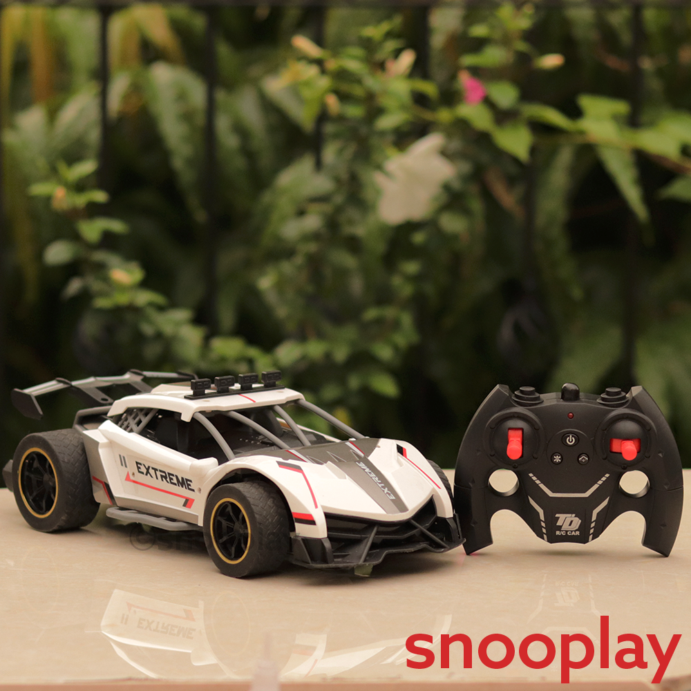 Remote Controlled Spray Runner Car with Rear Fog Steam Effect, LED Light & Sound | 1:12 Scale Model | Assorted Colours