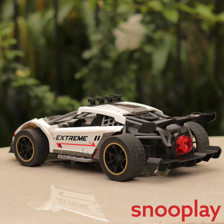 Remote Controlled Spray Runner Car with Rear Fog Steam Effect, LED Light & Sound | 1:12 Scale Model | Assorted Colours