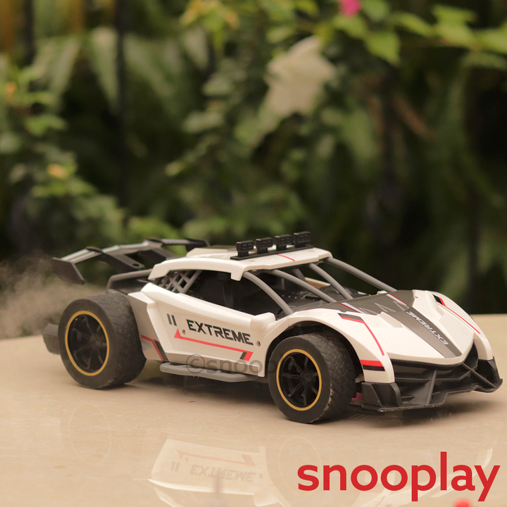 Remote Controlled Spray Runner Car with Rear Fog Steam Effect, LED Light & Sound | 1:12 Scale Model | Assorted Colours