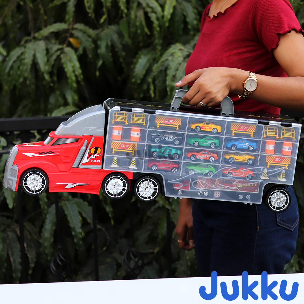 8-Wheeler Car Transporter with 10 Cars, 1 Mighty Truck, 16 Road Accessories & 1 Roadmap Game (3 Years till Grown Ups)