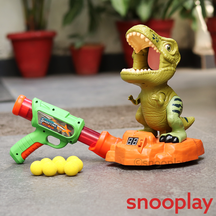 Catapult Dinosaur Targeting Vacuum Pressure Launcher with 8 Balls, Light & Music (3-8 Years)