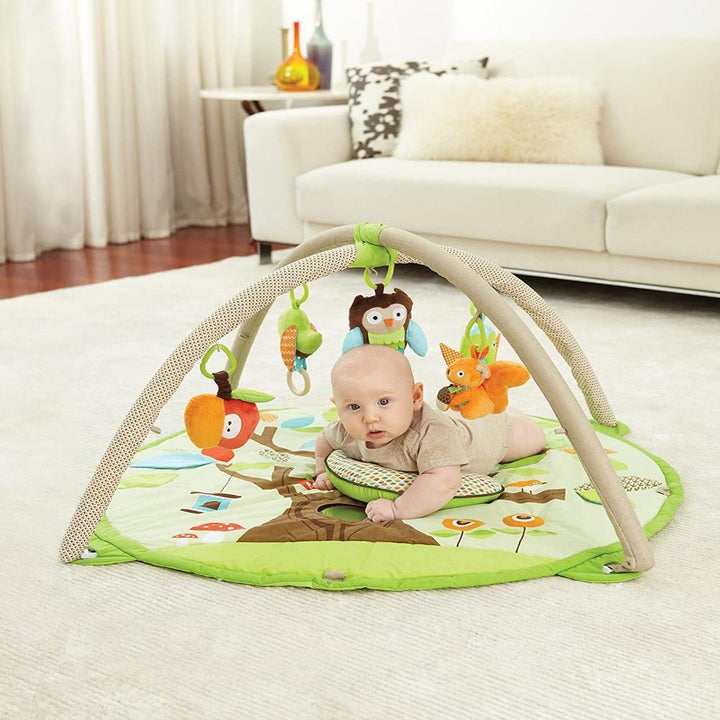 Skip Hop Treetop Friends Baby Activity Gym - Tummy Time, Overhead Play, Playmat | 17 Developmental Activities