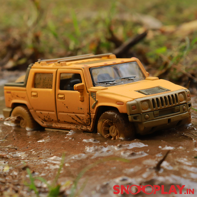 2005 Hummer H2 SUT Diecast Car Scale Model (1:40 Scale)- Assorted Colors