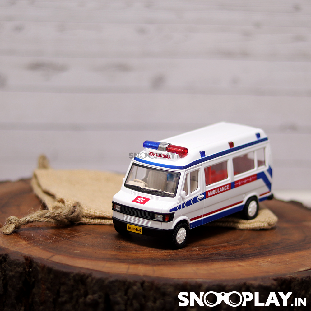 The TMP ambulance toy car that comes with a jute pouch for storage. 