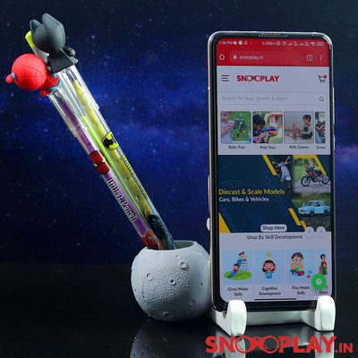 Astronaut pen stand with phone holder