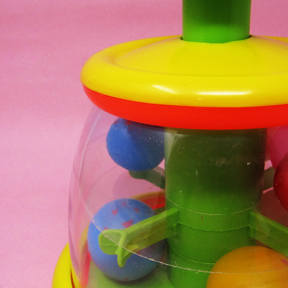 Anand Ball Top Toy (Press the Knob to Move the Multi Coloured Balls)