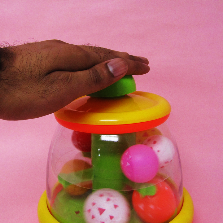 Anand Ball Top Toy (Press the Knob to Move the Multi Coloured Balls)