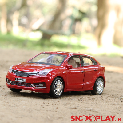 The brilleo toy car that closely resembles the Baleno toy car, red in colour.