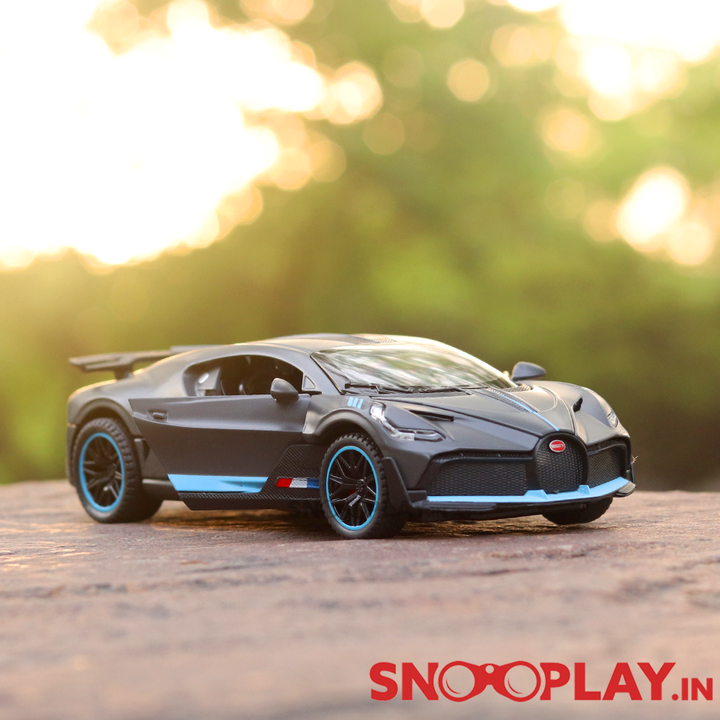 Supercar Diecast Scale Model (3214) resembling Bugatti Divo (comes with light & sound) - Assorted Colors (Scale 1:32)