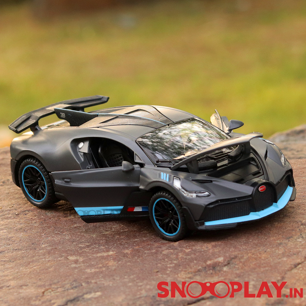 Supercar Diecast Scale Model (3214) resembling Bugatti Divo (comes with light & sound) - Assorted Colors (Scale 1:32)