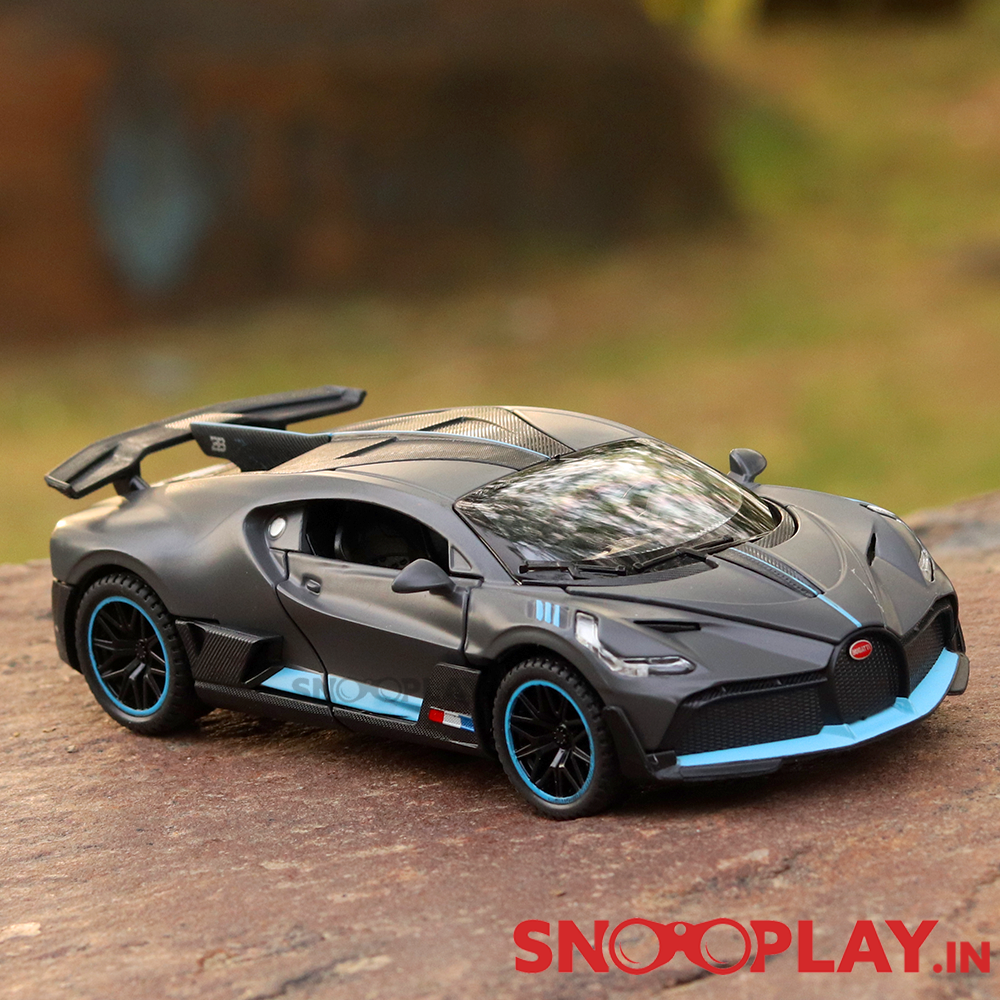 Supercar Diecast Scale Model (3214) resembling Bugatti Divo (comes with light & sound) - Assorted Colors (Scale 1:32)