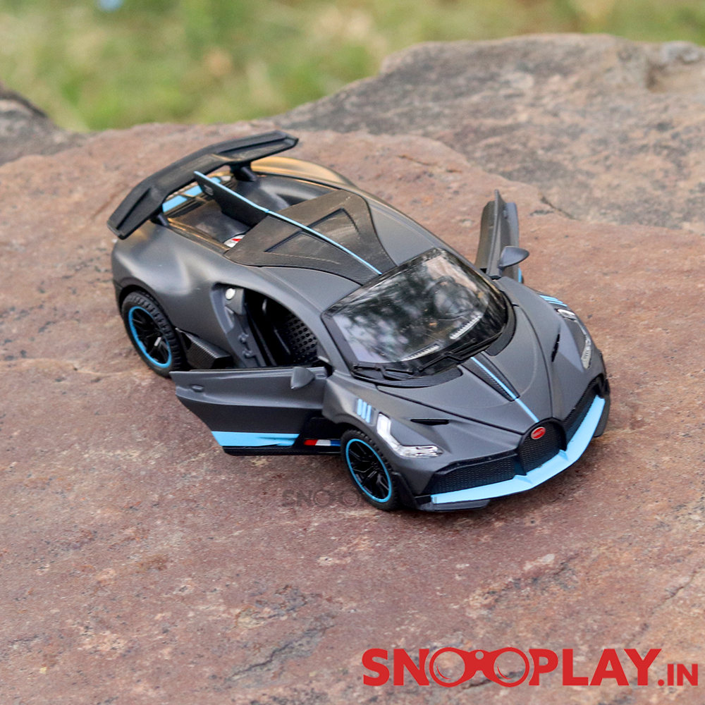Supercar Diecast Scale Model (3214) resembling Bugatti Divo (comes with light & sound) - Assorted Colors (Scale 1:32)