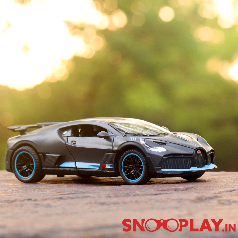 Supercar Diecast Scale Model (3214) resembling Bugatti Divo (comes with light & sound) - Assorted Colors (Scale 1:32)