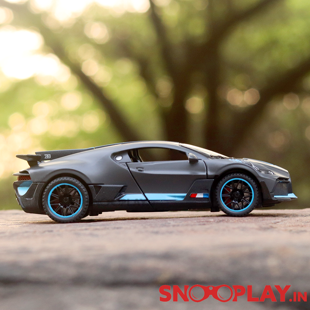 Supercar Diecast Scale Model (3214) resembling Bugatti Divo (comes with light & sound) - Assorted Colors (Scale 1:32)