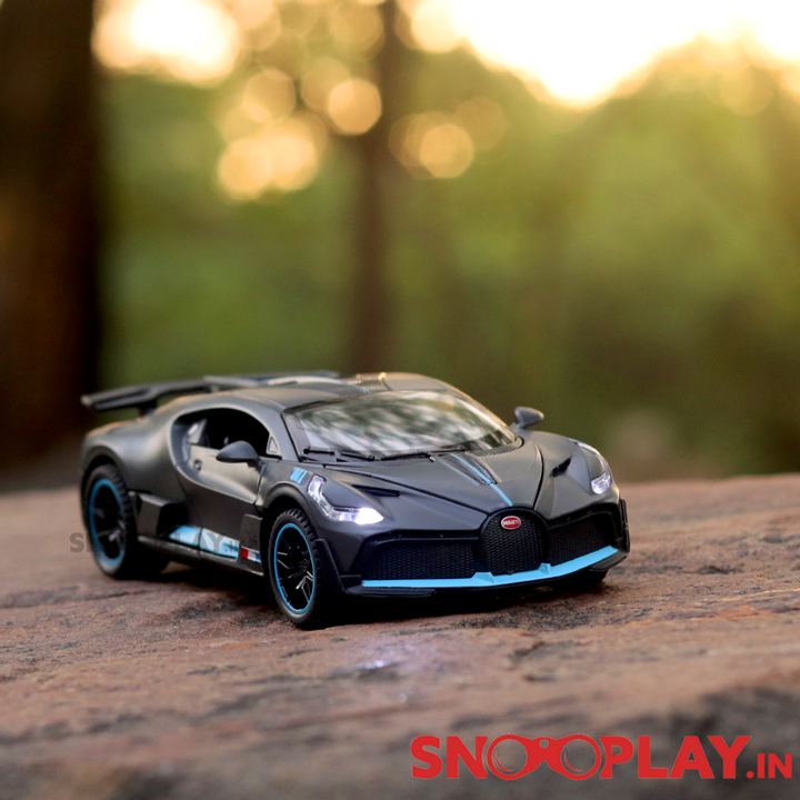 Supercar Diecast Scale Model (3214) resembling Bugatti Divo (comes with light & sound) - Assorted Colors (Scale 1:32)