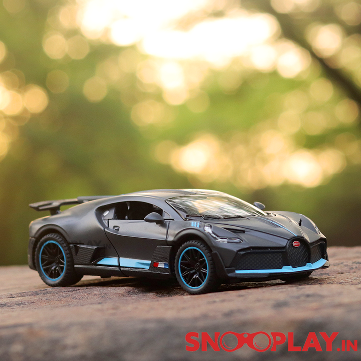 Supercar Diecast Scale Model (3214) resembling Bugatti Divo (comes with light & sound) - Assorted Colors (Scale 1:32)