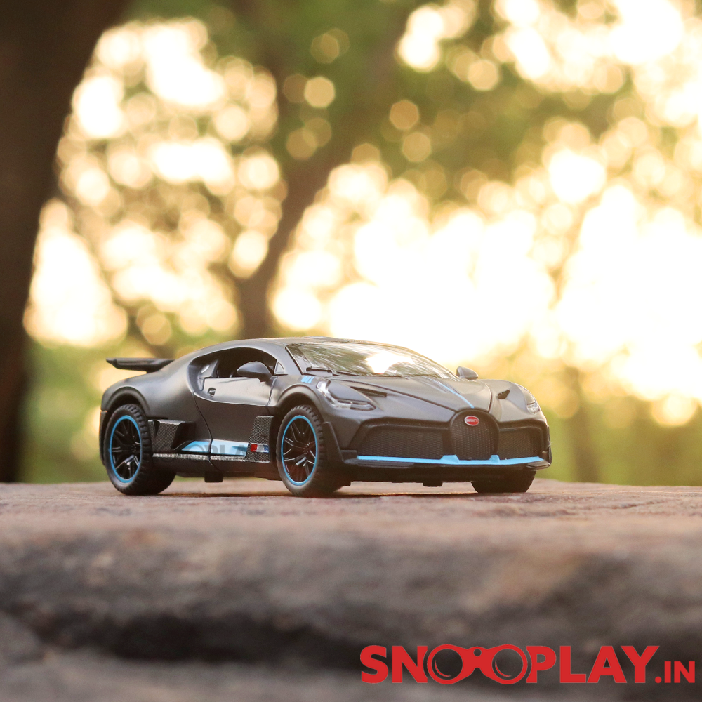 Supercar Diecast Scale Model (3214) resembling Bugatti Divo (comes with light & sound) - Assorted Colors (Scale 1:32)