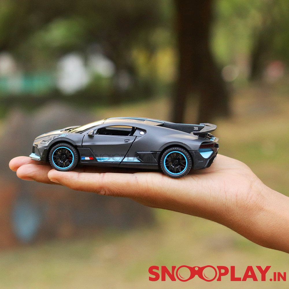 Supercar Diecast Scale Model (3214) resembling Bugatti Divo (comes with light & sound) - Assorted Colors (Scale 1:32)