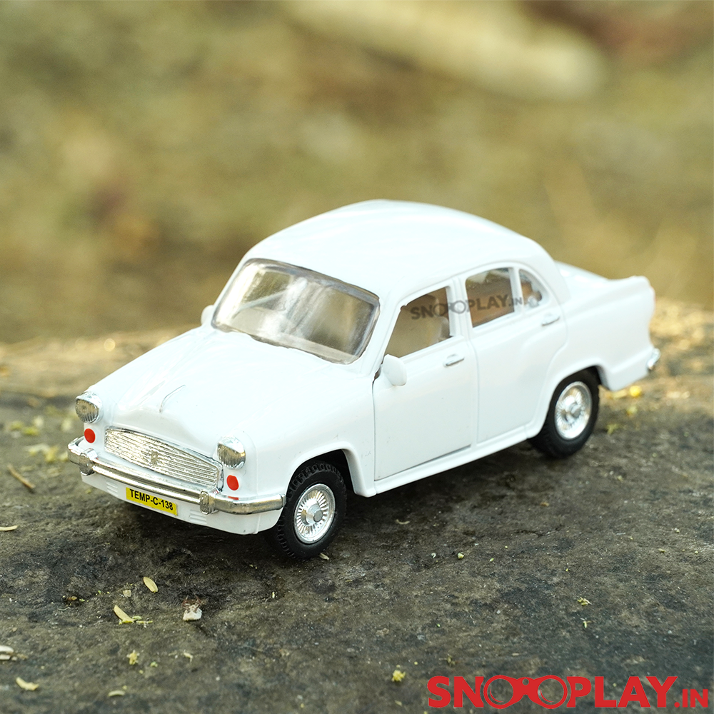 The Ambassador toy car with classic sleek white exterior and free rolling wheels.