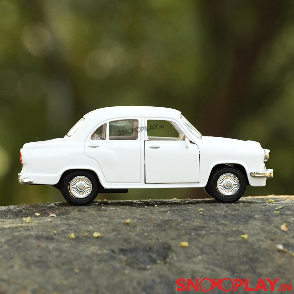 Left view of the miniature model of the Ambassador car, with a pull back feature, to go back to the 90's.