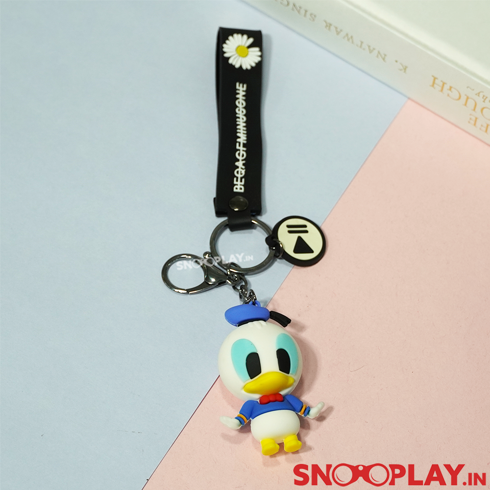 The cutest keychain of 3D Donald Duck with a classic blue outfit with a black band and a lobster clasp. 