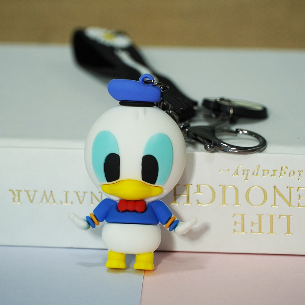 3D Donald duck keychain with lobster clasp hook and band, with the height of Donald duck being 2.6 inches.