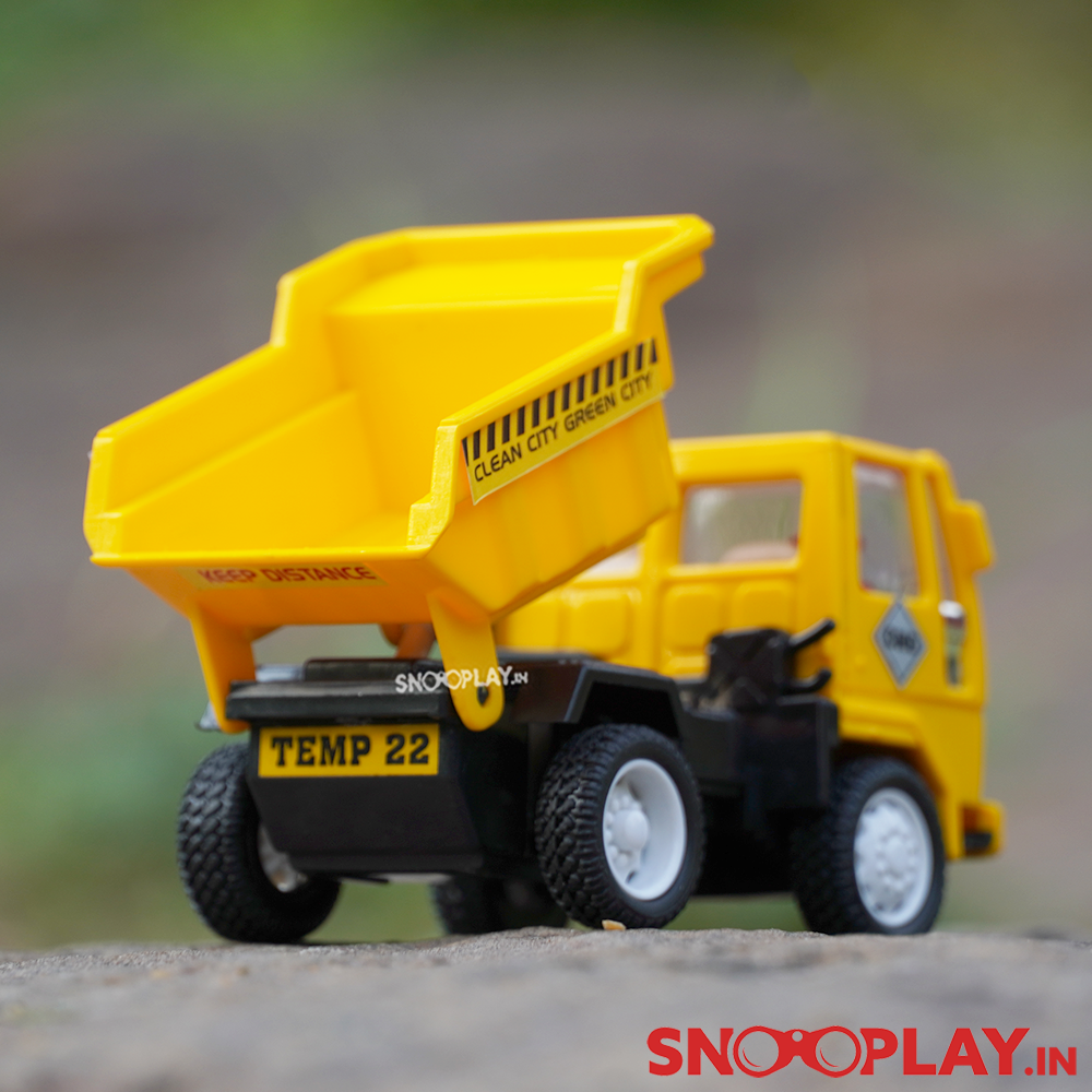 Dumper truck toy with a pull back feature, perfect for those who like to pretend play as a construction worker.
