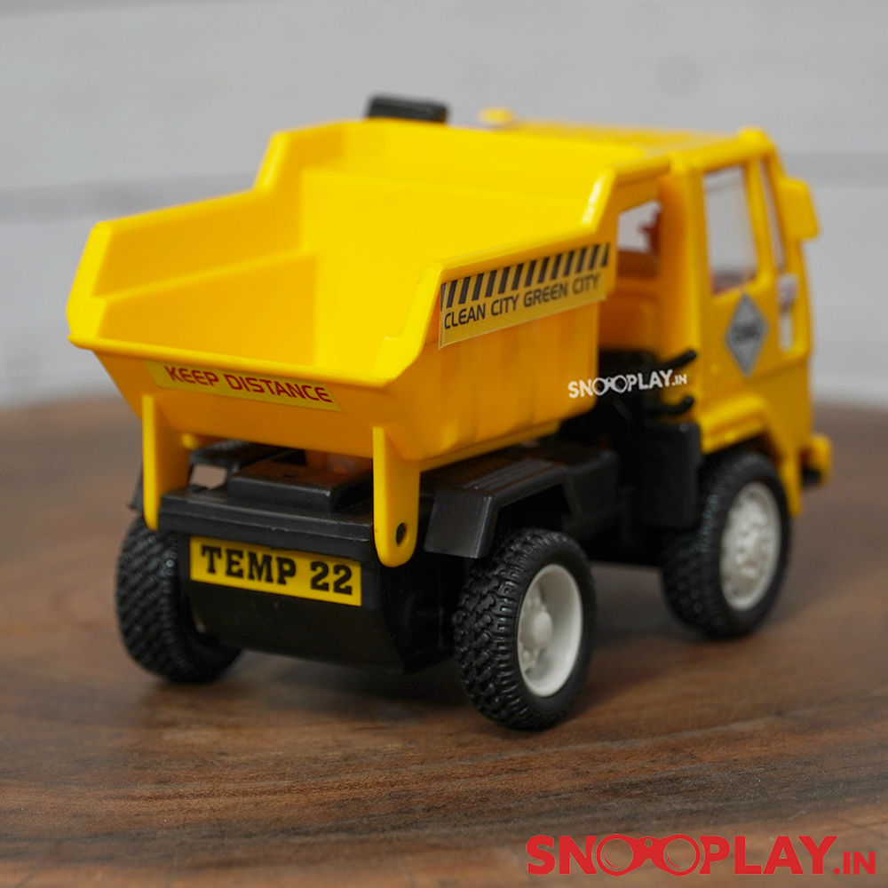 The back side of the dumper truck toy that comes with a tilt able tray which tilt when the lever is pulled. 