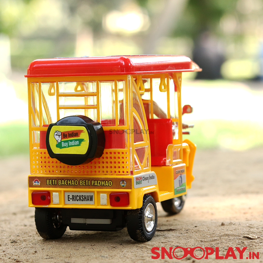The back side of the E Rickshaw miniature model for kids that comes with a complimentary jute pouch.