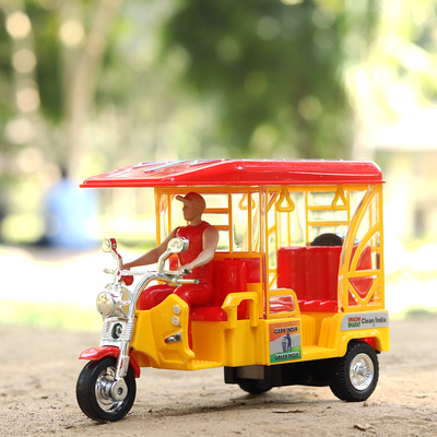 The beautifully designed E Rickshaw toy model, red and yellow in colour, that makes a perfect collectible.