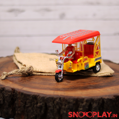 The miniature model of the three wheeler that looks exactly like tuktuk autorickshaw you see in the streets.