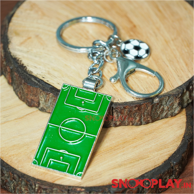 The metallic football field keyring, green in colour, is a best gift for all the football lovers.