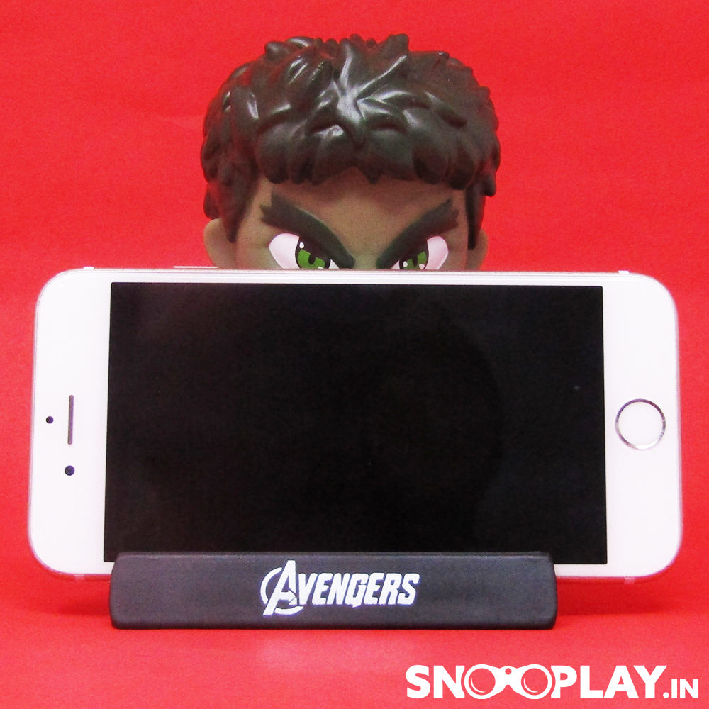Horizontal view of Hulk Bobble Head Action Figure holding a phone in its built in phone stand.