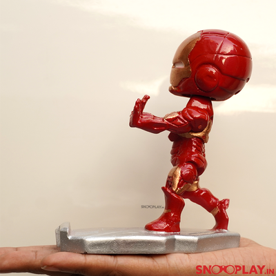 Figure of Iron Man Bobblehead, of height 4.72 inches, with a phone stand.