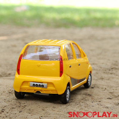 The back side of the nano miniature toy car that speeds forward when pulled back.