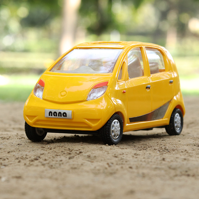 The yellow coloured miniature model of the popular Nano car.