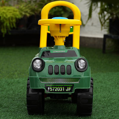 The non electronic military jeep rider, green and yellow in colour, with a steering wheel and a horn for kids.