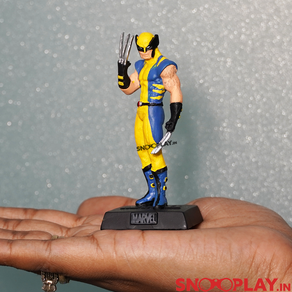 The Wolverine marvel action figure with an approx height of 3.2 inches along with the base.