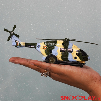 The army helicopter toy of length 6.8 inches and height 2 inches approx.