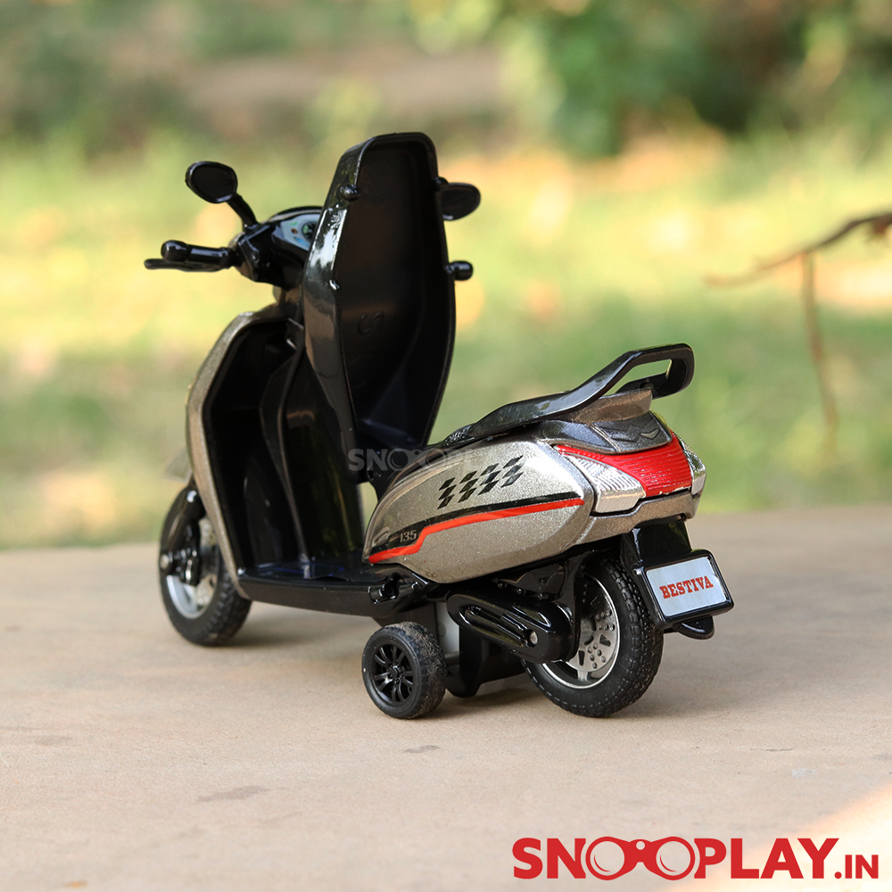 The back side of the beautifully designed replica model of the Bestiva Scooty toy with openable seat.