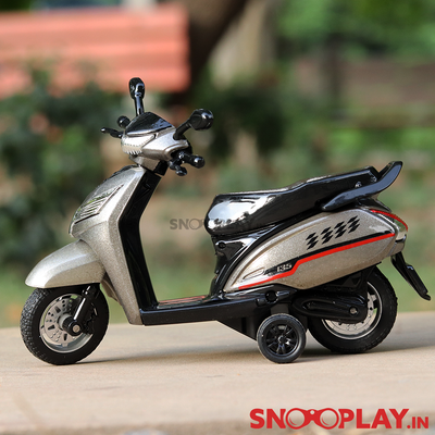 The beautifully designed feature toy car Bestiva Scooty Toy to use for your decoration ideas for rooms of children.