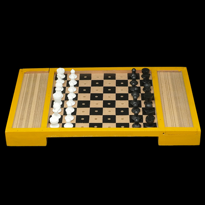 Braille chess board game that has chess board raised and lowered squares, allowing the player to easily move the pieces across the chess board.