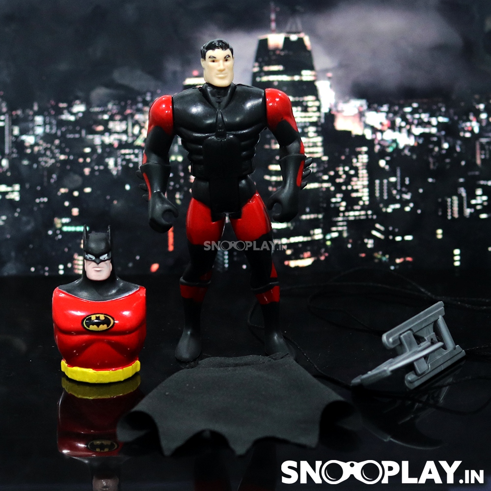The Bruce Wayne Decoy figurine with a batman body top and a rope launcher.
