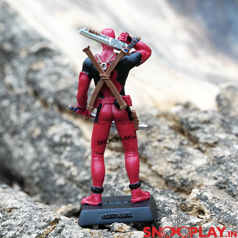 The most beloved marvel superhero, Deadpool marvel action figure, with red and black glory on it.