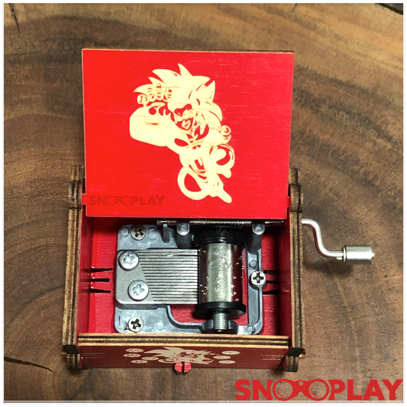 The highly decorated wooden musical box that plays the Dragon Ball Z song when you turn the handle.