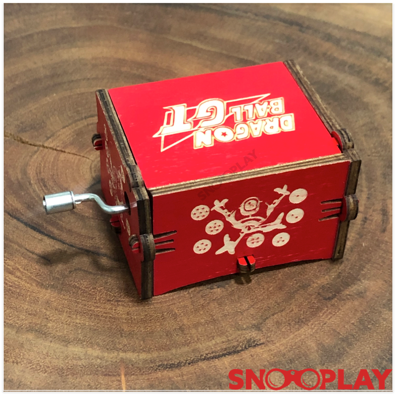 The non battery operated red coloured wooden musical box that plays the dragon ball z tone.